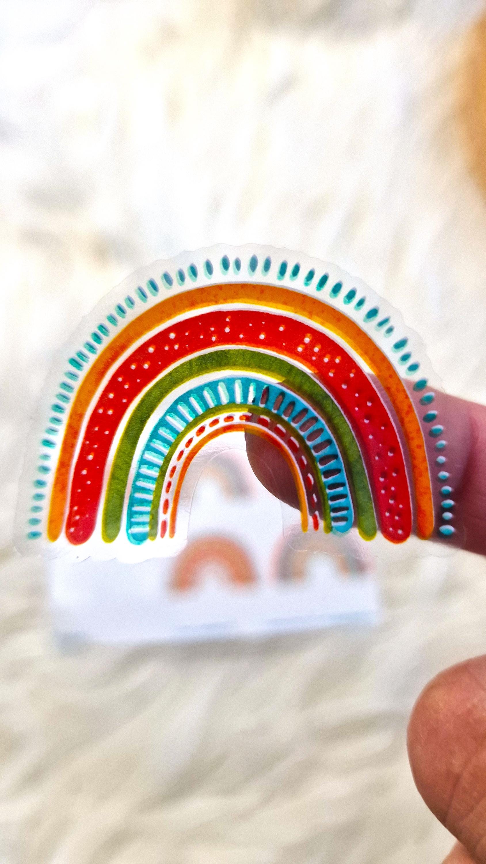 „Regenbogen Aufkleber auf Brotdose“
„Sticker Set Regenbogen Motiv auf Trinkflasche“
„Wasserfester Vinyl-Aufkleber mit Namen“
„Kinder Trinkflasche personalisiert mit Sticker“
„Sticker DIN A5 buntes Regenbogenmotiv“
