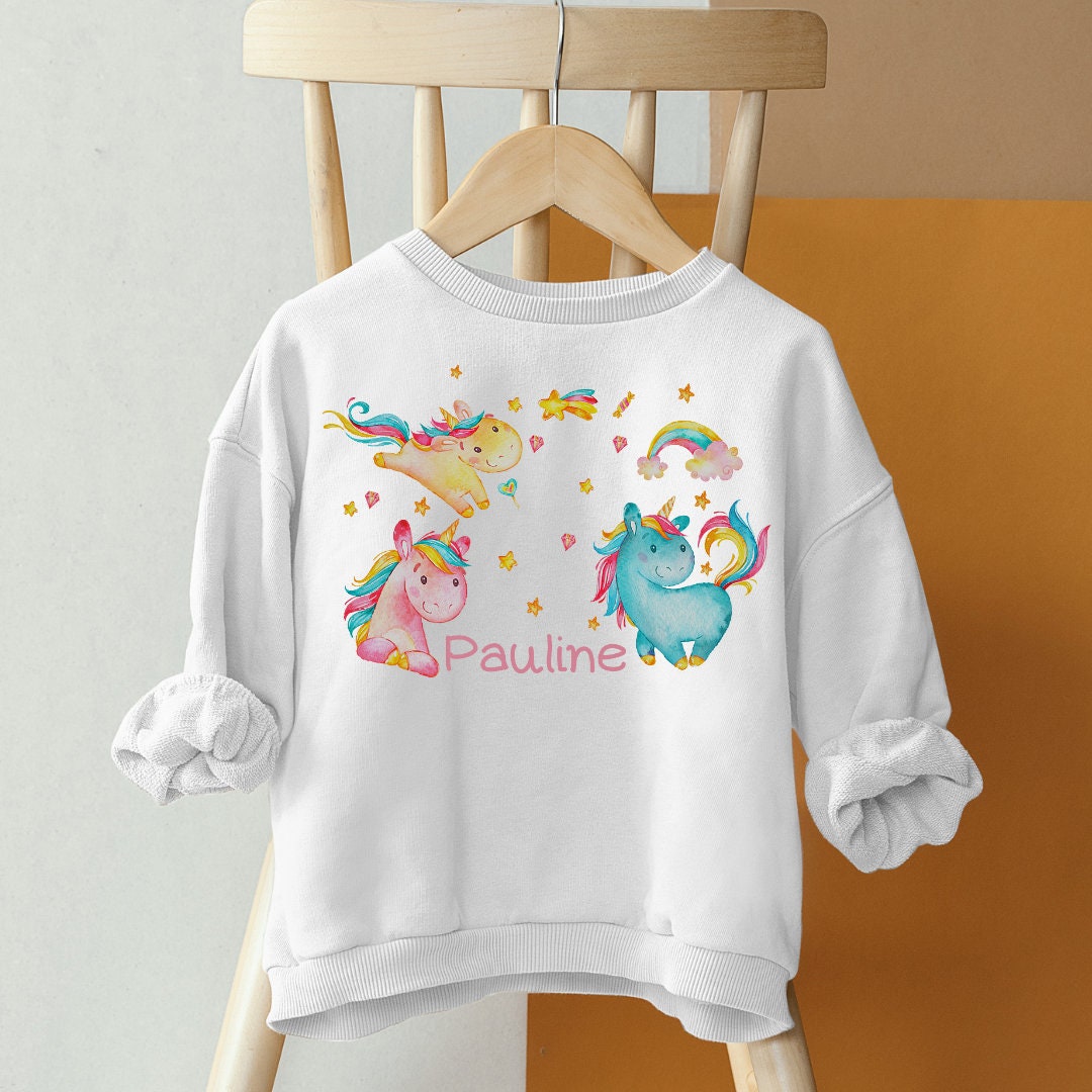 Pullover Sweatshirt Sweater personalisiert Kinderpullover Babypullover Einhorn Regenbogen Glitzerstaub Sterne